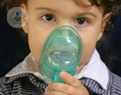 asma infantil niño inhalador